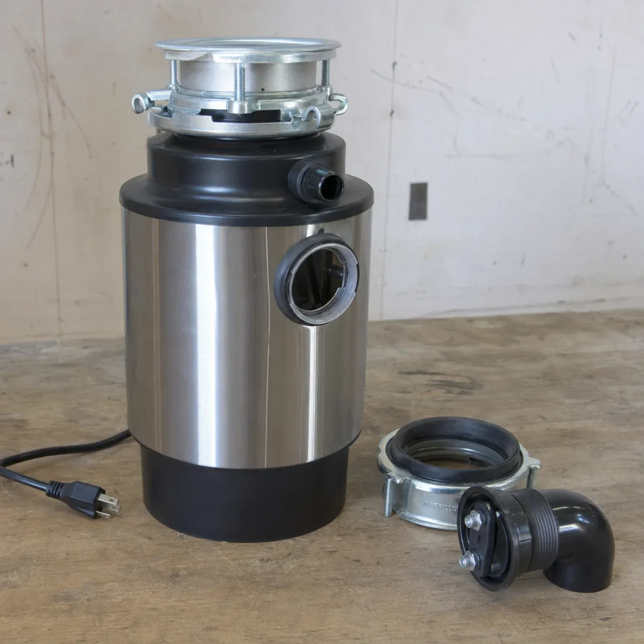 Garbage disposal and its mounting hardware